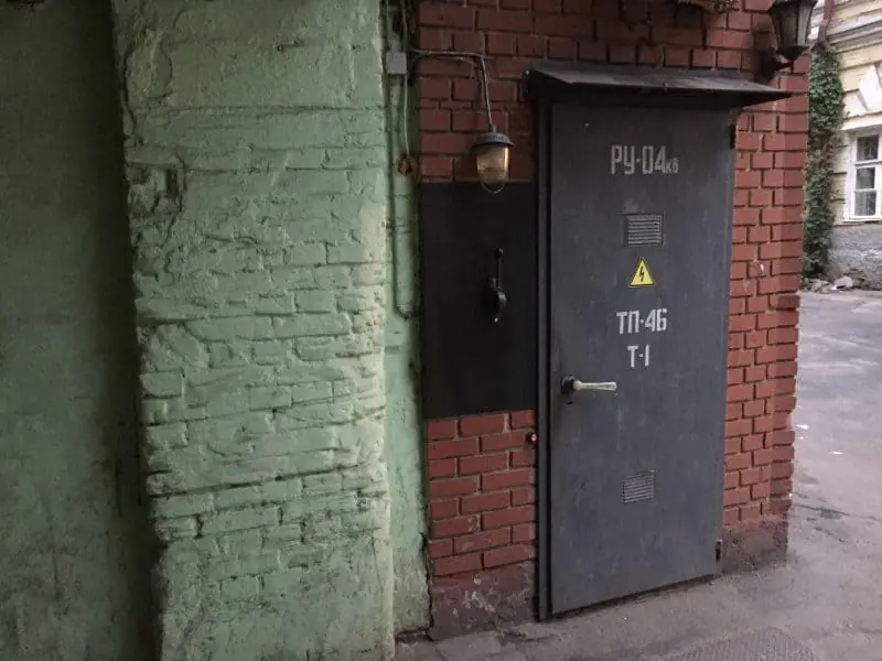 Loggerhead's unmarked industrial door and entrance lever