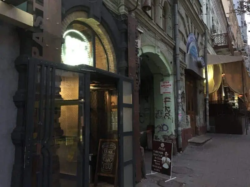 The green courtyard entrance near Loggerhead in Kyiv
