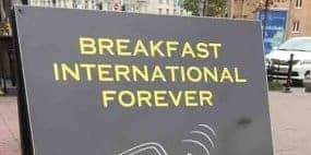 Breakfast International Forever sign outside Roast and Brew in Kyiv